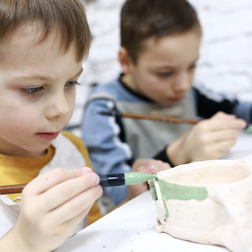 Kids make a mug pottery workshop